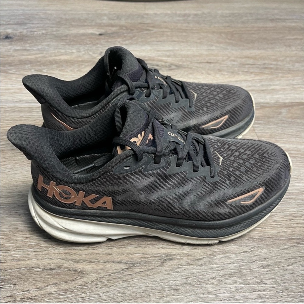 Hoka women’s Black and rose gold Athletic Shoes